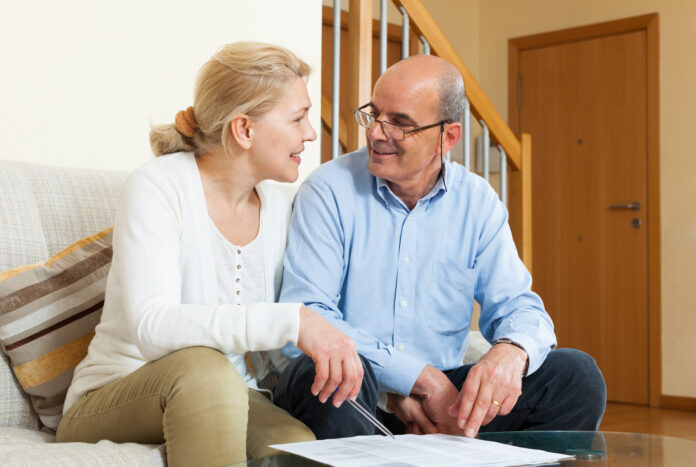 Mature couple with financial documents